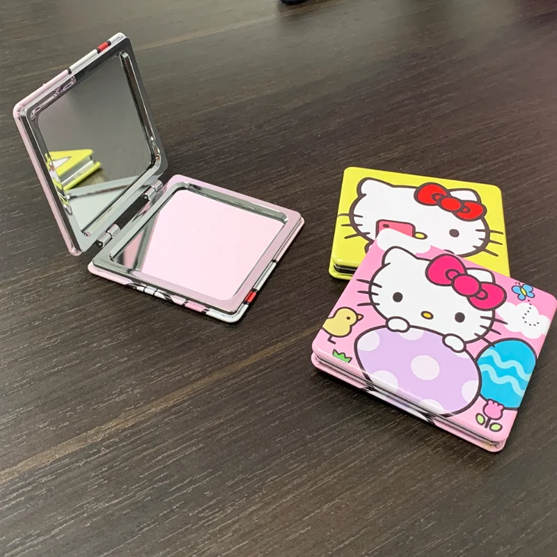 Огледалото на Hello Kitty малко Джобно огледало на Hello Kitty Sanrio Преносими сгъваеми огледала с двустранно изображение, Подарък за грим на момичето Изображение 1